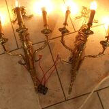 Pair of gilded bronze wall sconces with three lights