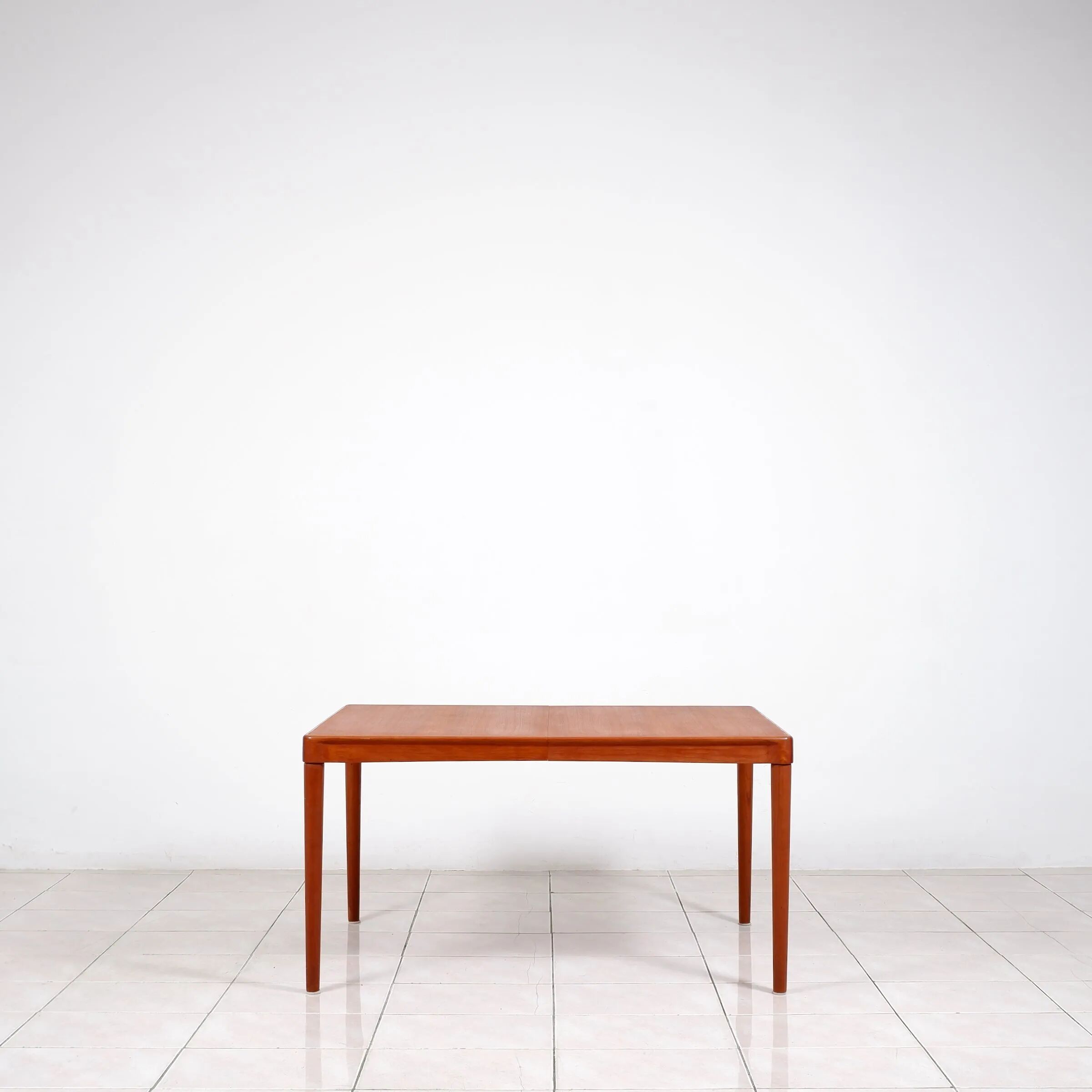 Extendable dining table in teak by H. W. Klein for Bramin Mobler