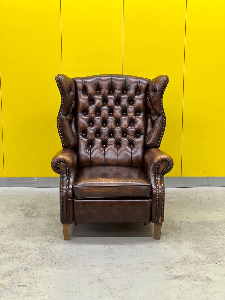 Brown vintage handmade chesterfield recliner armchair