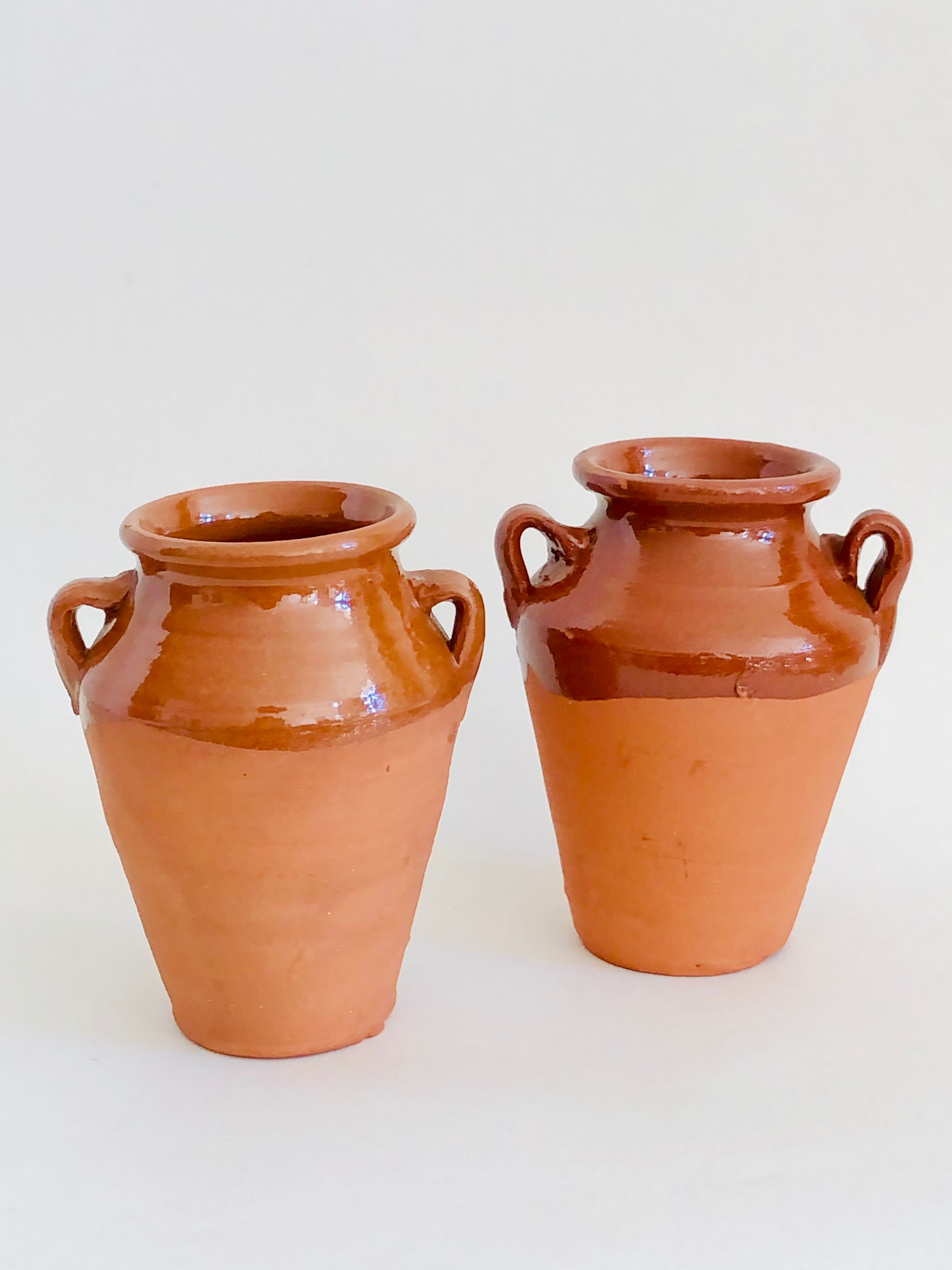 Pair of terracotta amphora vases
