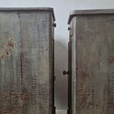 Pair of antique bedside tables with a green patina