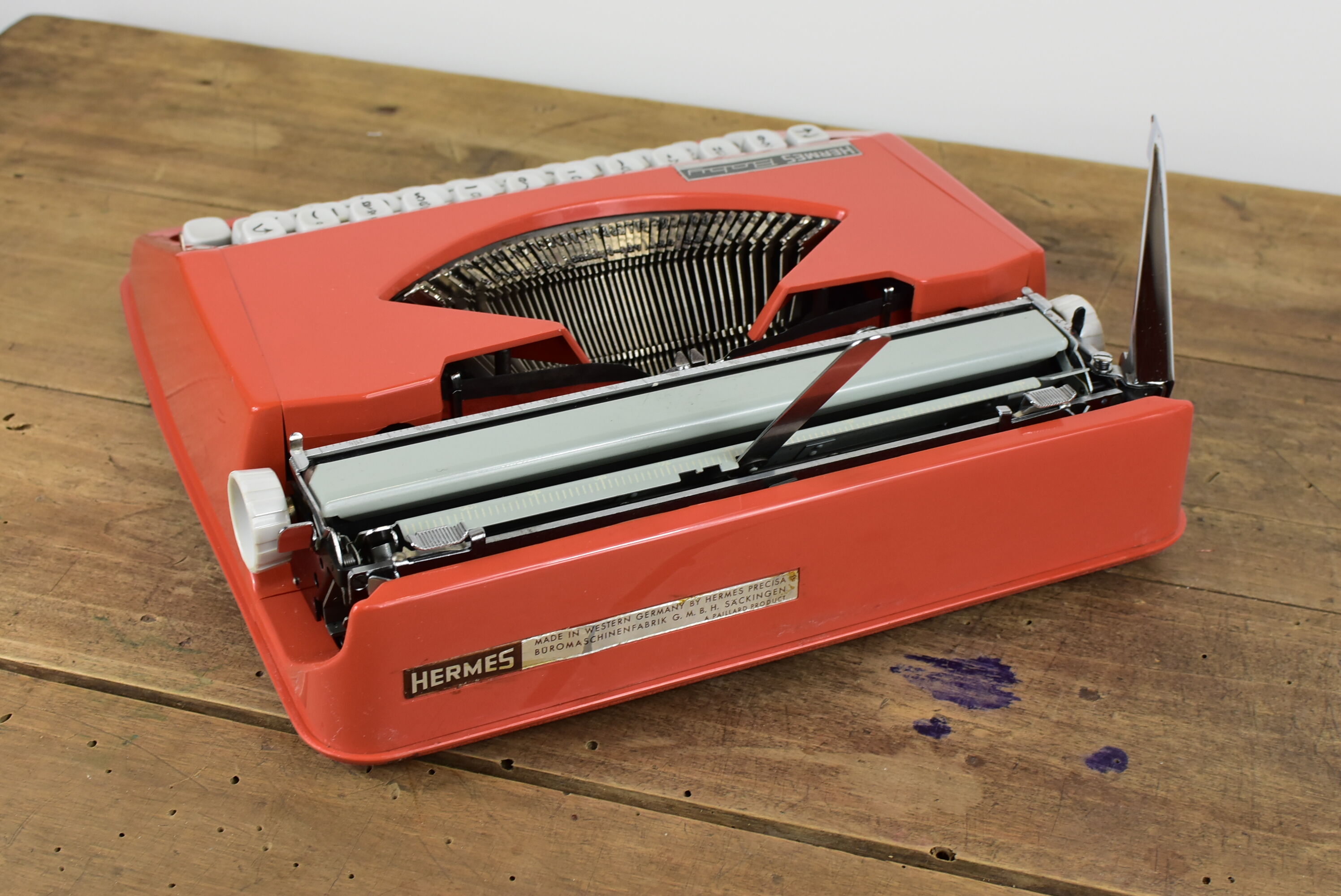 Hermès Baby orange typewriter.