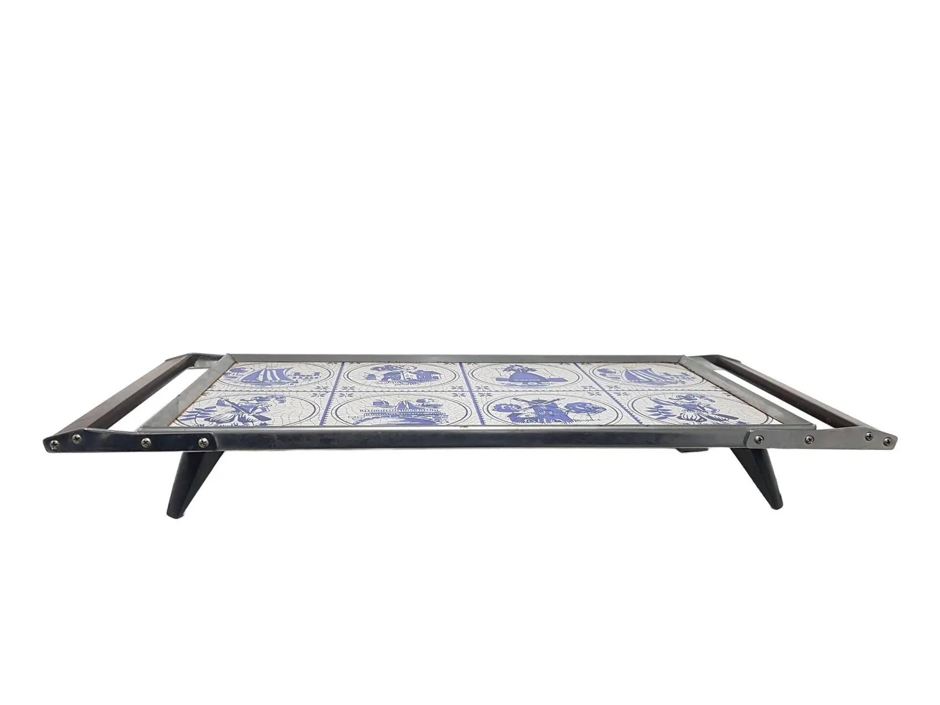 Heating plate, blue and white ceramic, brown rosewood, black metal, Germany, 1970s.