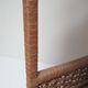 Corner shelf made of vintage braided natural fibers