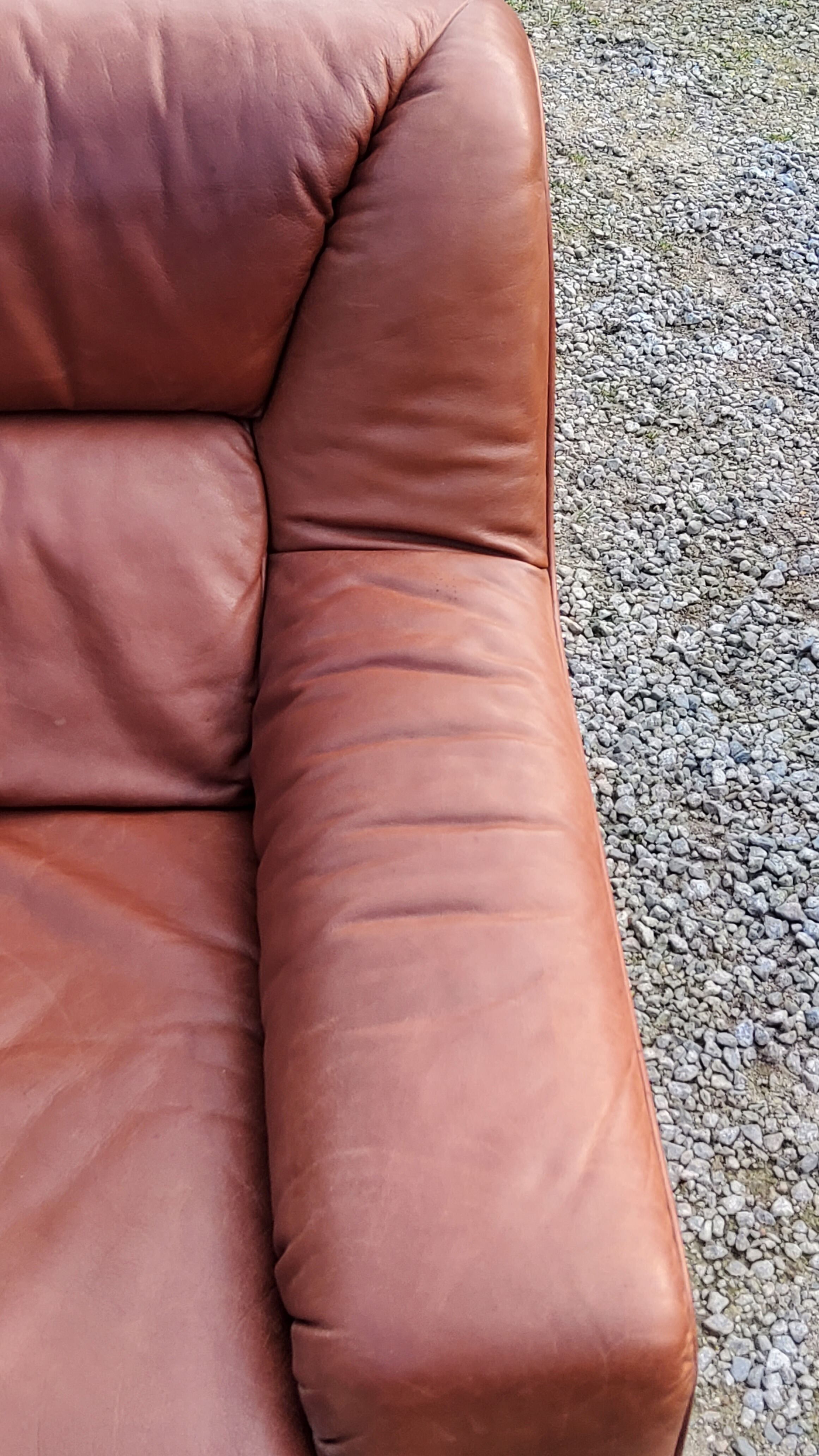 Pair of armchairs and De Sede sofa in cognac leather from the 70s/80s