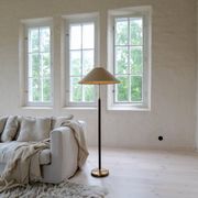 Mid-century brown leather and patinated brass floor lamp by Falkenbergs Belysning, Sweden, 1960s.