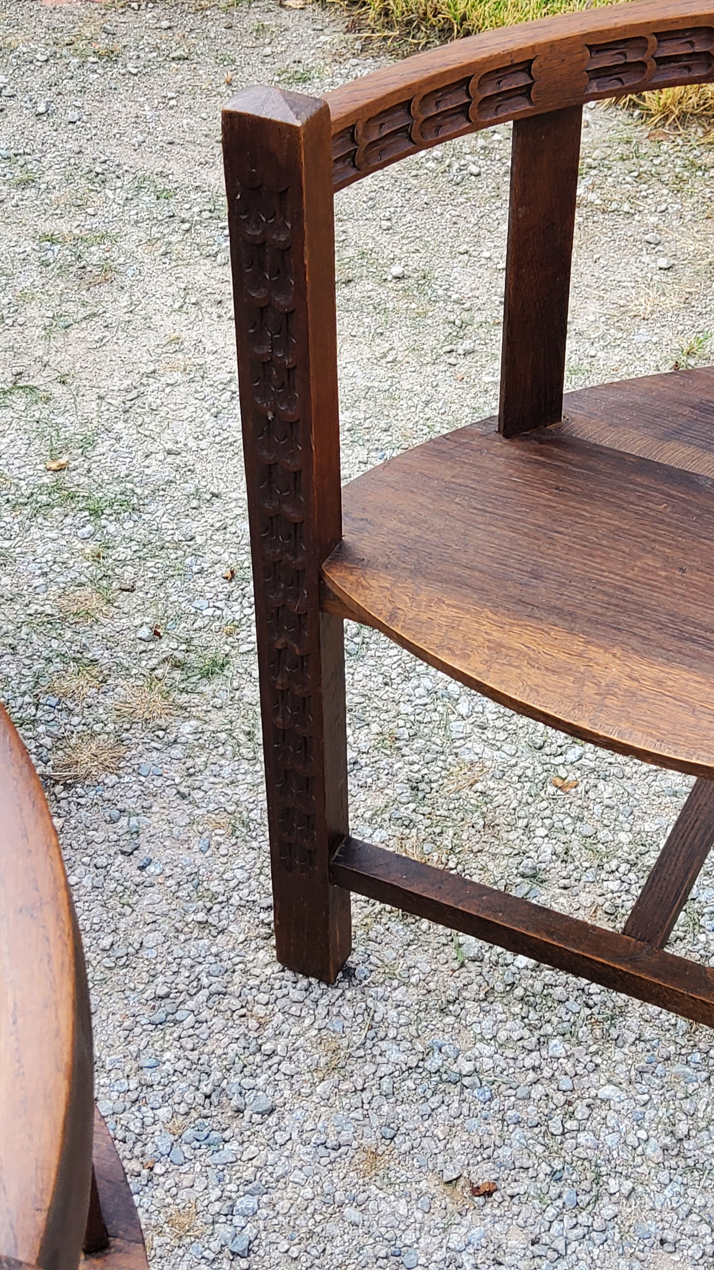Set of three brutalist tripod armchairs in carved solid oak