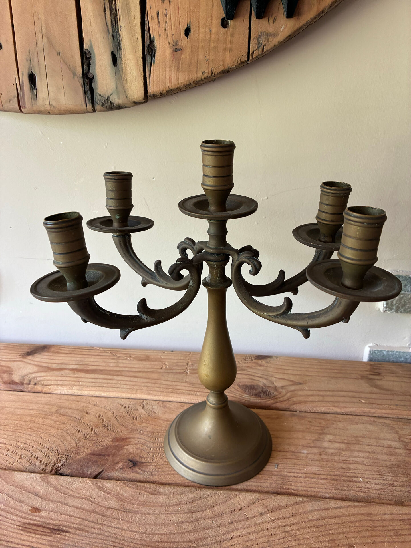 Pair of large 5-light candlesticks in patinated brass, classical style.