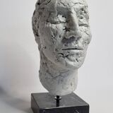 Clay sculpted head on marble base, 32 cm