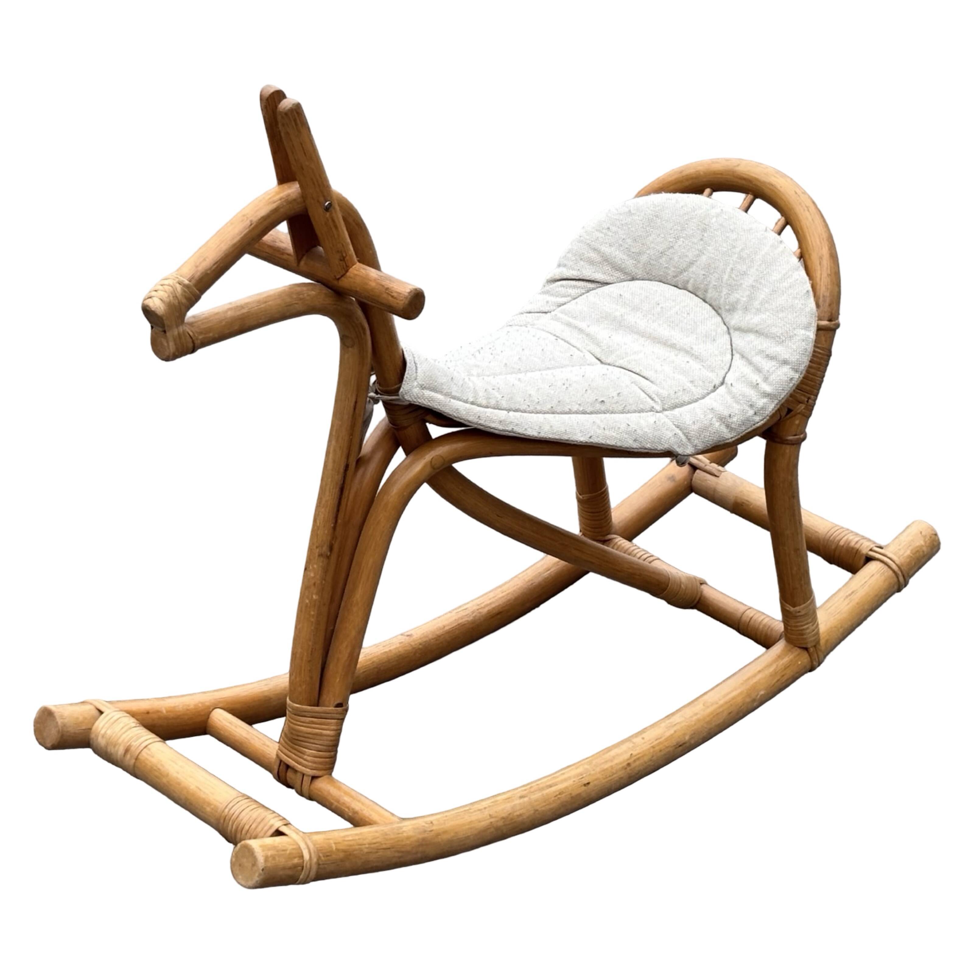 Vintage rattan rocking horse for a 1960s nursery design
