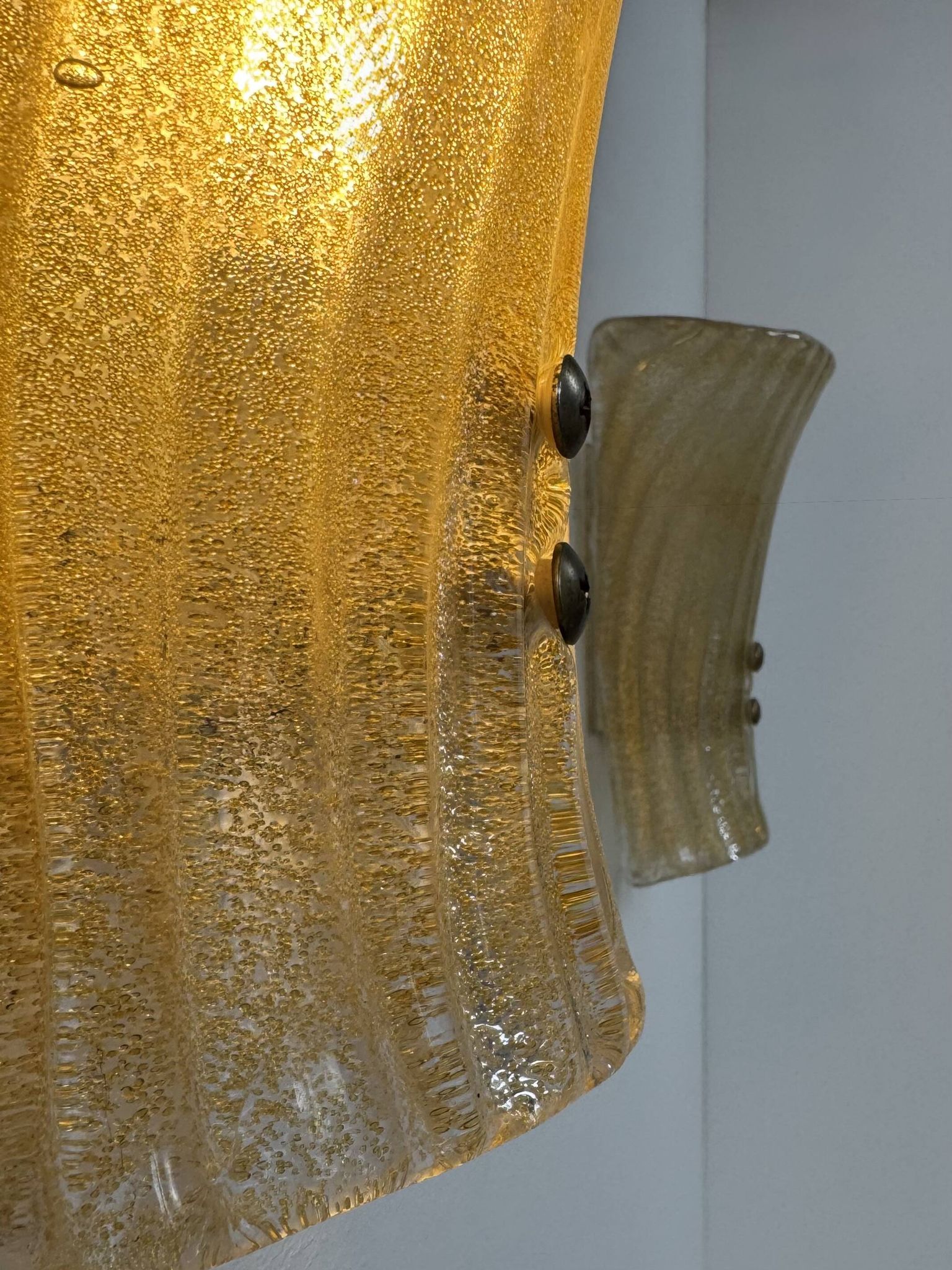 Pair of vintage Murano glass wall lights, pressed moulded, Italy, 1980.