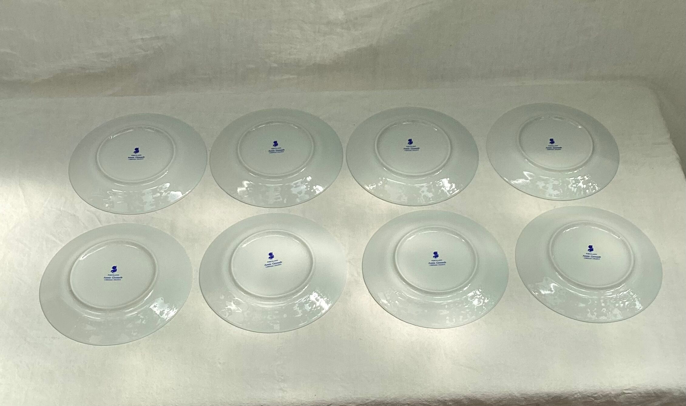 Set of eight limoges porcelain dessert plates Annie Grenade