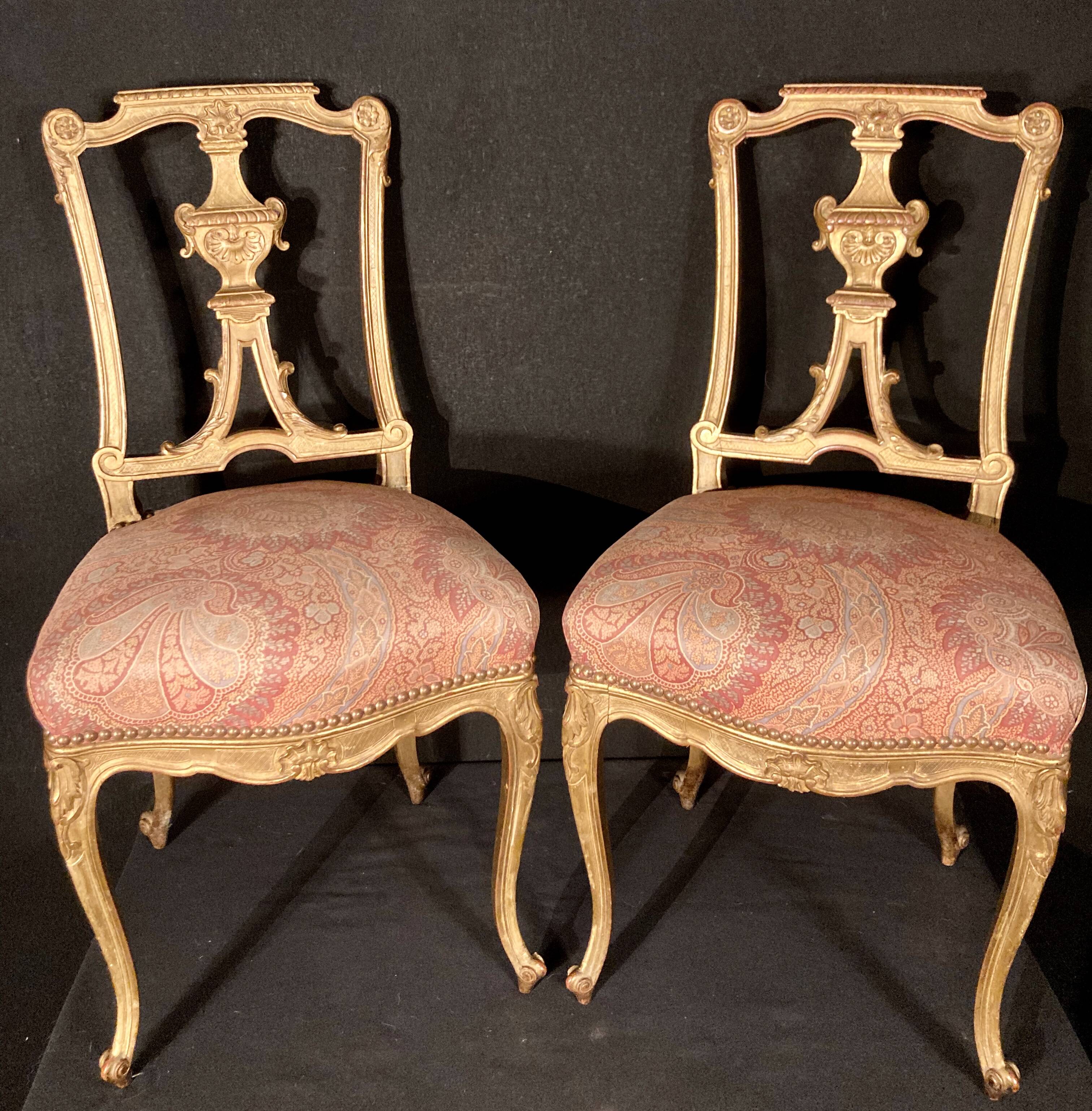 Pair of gilded wooden chairs