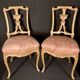 Pair of gilded wooden chairs