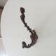 Antique wall coat hook from the 19th century in Victorian cast iron style.