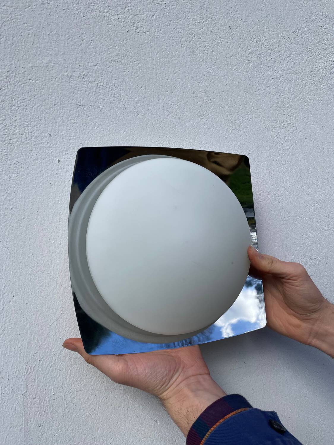 White glass and stainless steel ceiling light