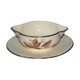 Gien earthenware saucière decorated with foliage