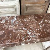 Red marble fireplace in the Louis XVI style, late 19th century