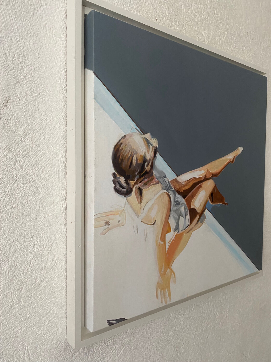 Seated woman painting