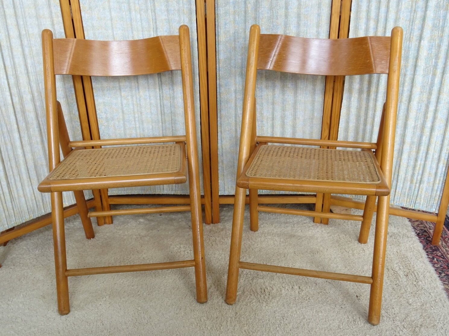 Pair of canned folding chairs