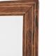 Old rectangular wooden mirror, frame decorated with edges