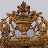Regency style beaded mirror in carved and gilded wood, early 19th century