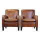 Set of 2 characterful, comfortable armchairs made of sheepskin leather with a sleek Art Deco design