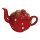 Vintage red teapot with white polka dots.