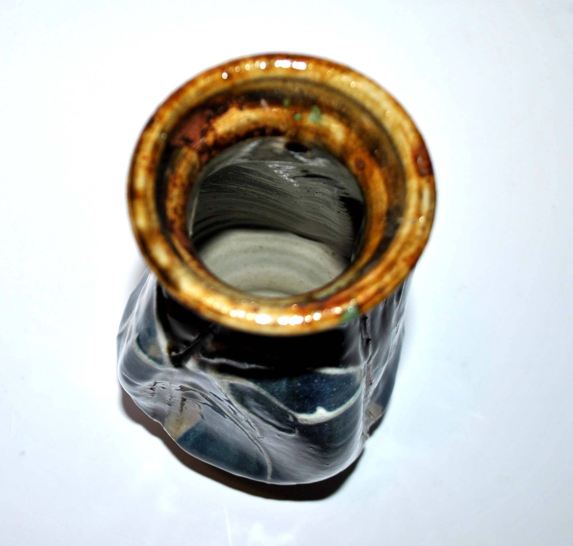 Old ceramic vase signed