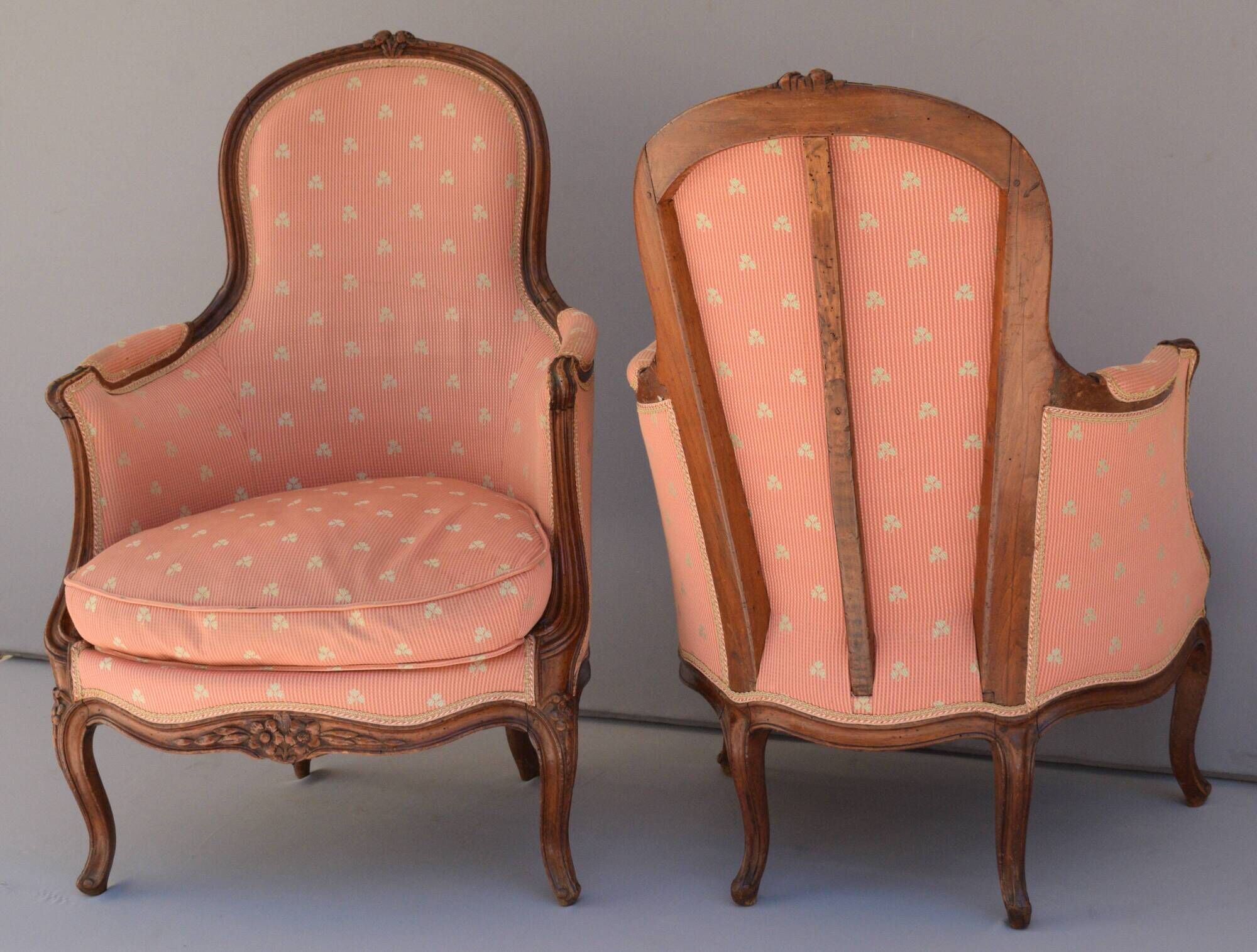 Pair of Louis XV period bergeres in walnut