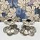 Paire de bougeoirs fleurs