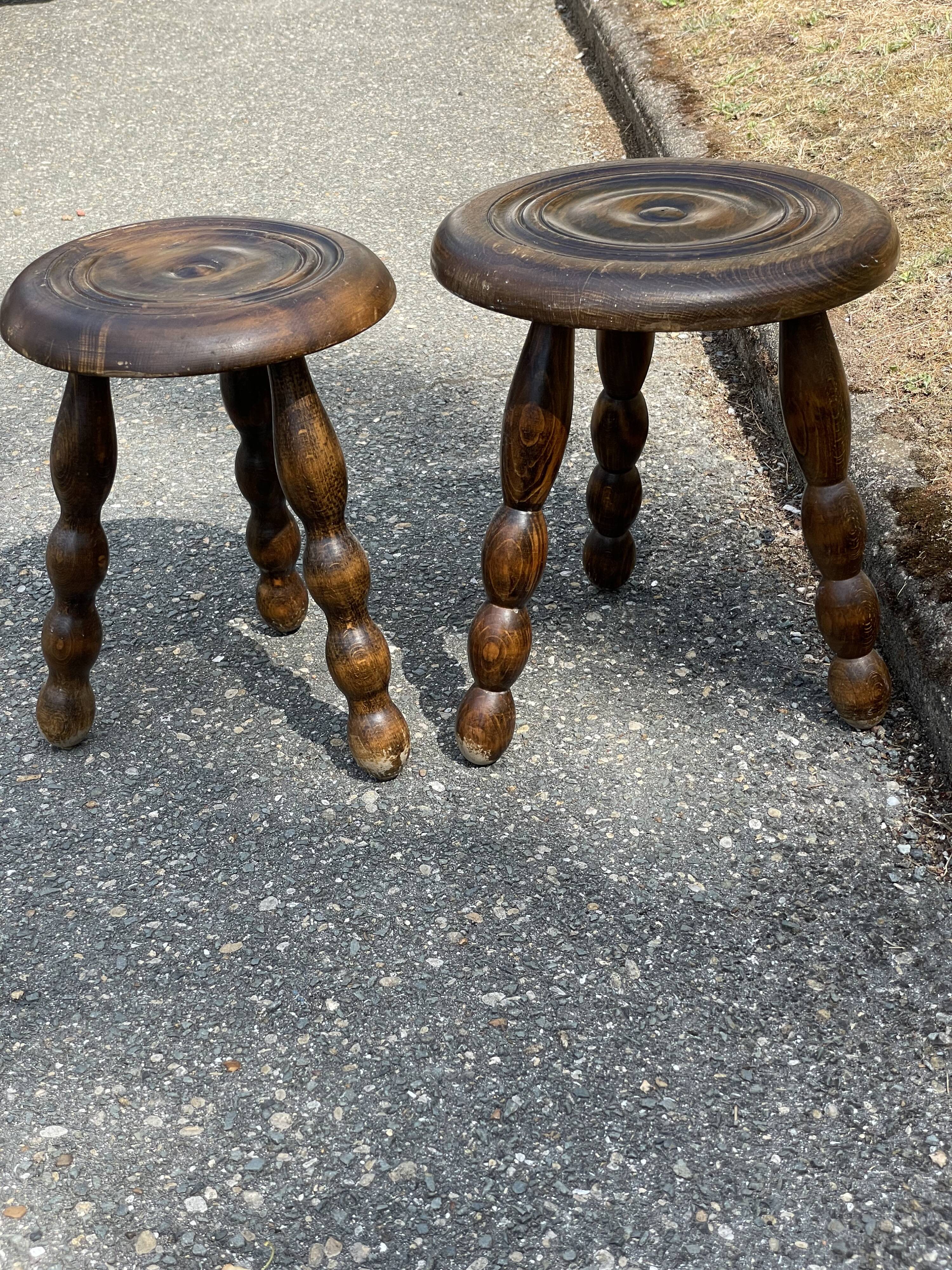 Duo of tripod oak stools