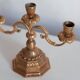 Decorative golden metal candle holders from the mid-20th century, Menora, France, 1960s.