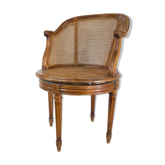 Louis XVI-style rotating canné desk in solid wood.