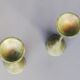 Pair of bronze patina metal candlesticks
