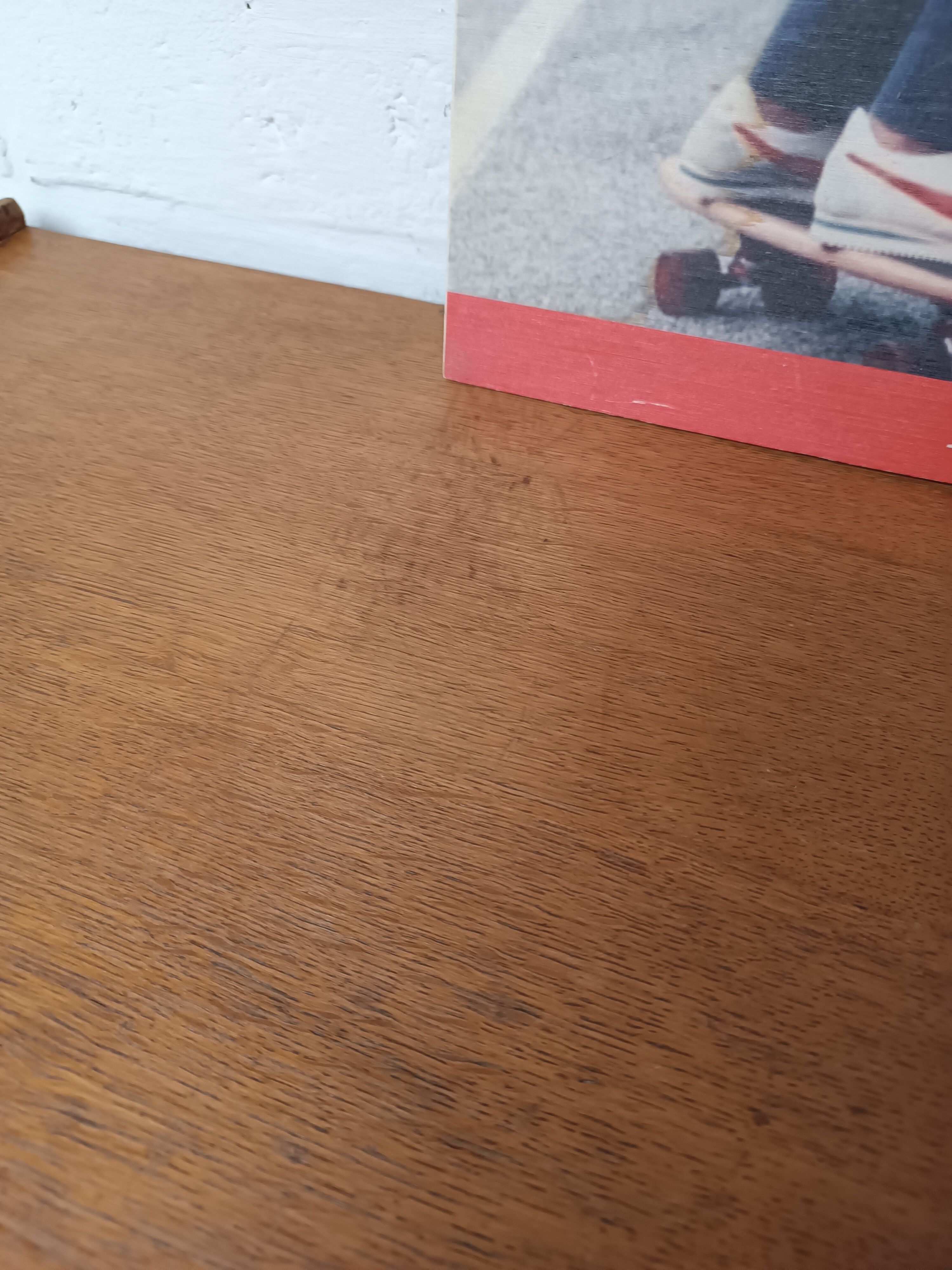 High wooden chest of drawers in the 50s