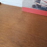 High wooden chest of drawers in the 50s