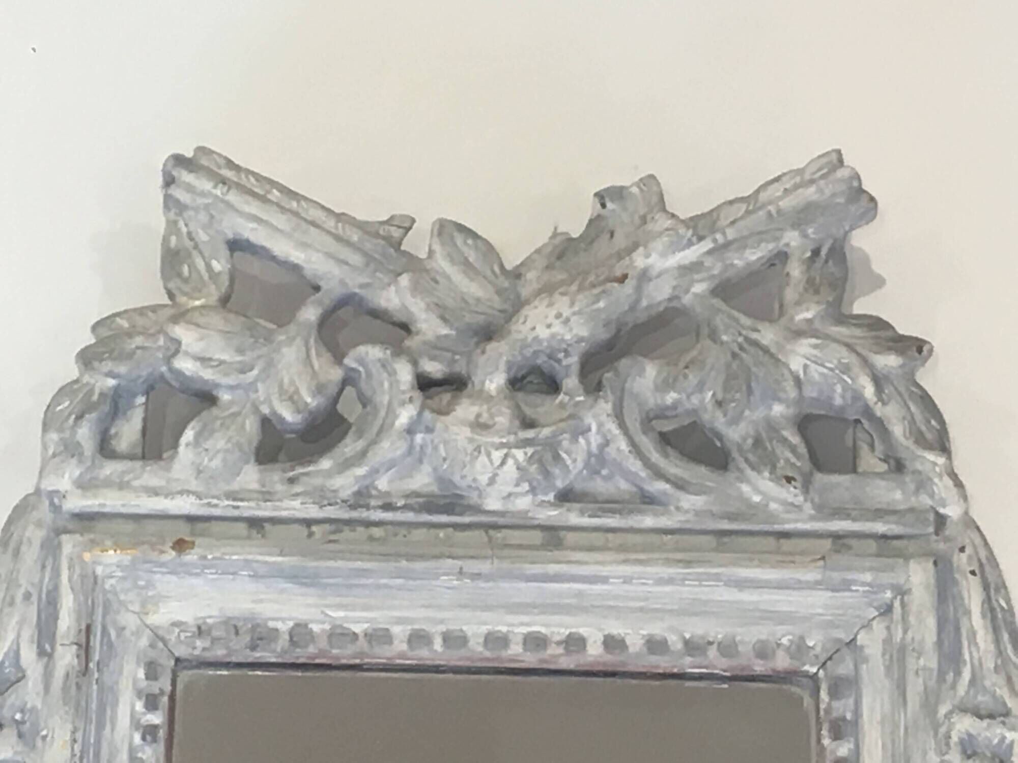 Louis XVI Style Mirror in Carved Wood with Grey Patina and Dove Pediment