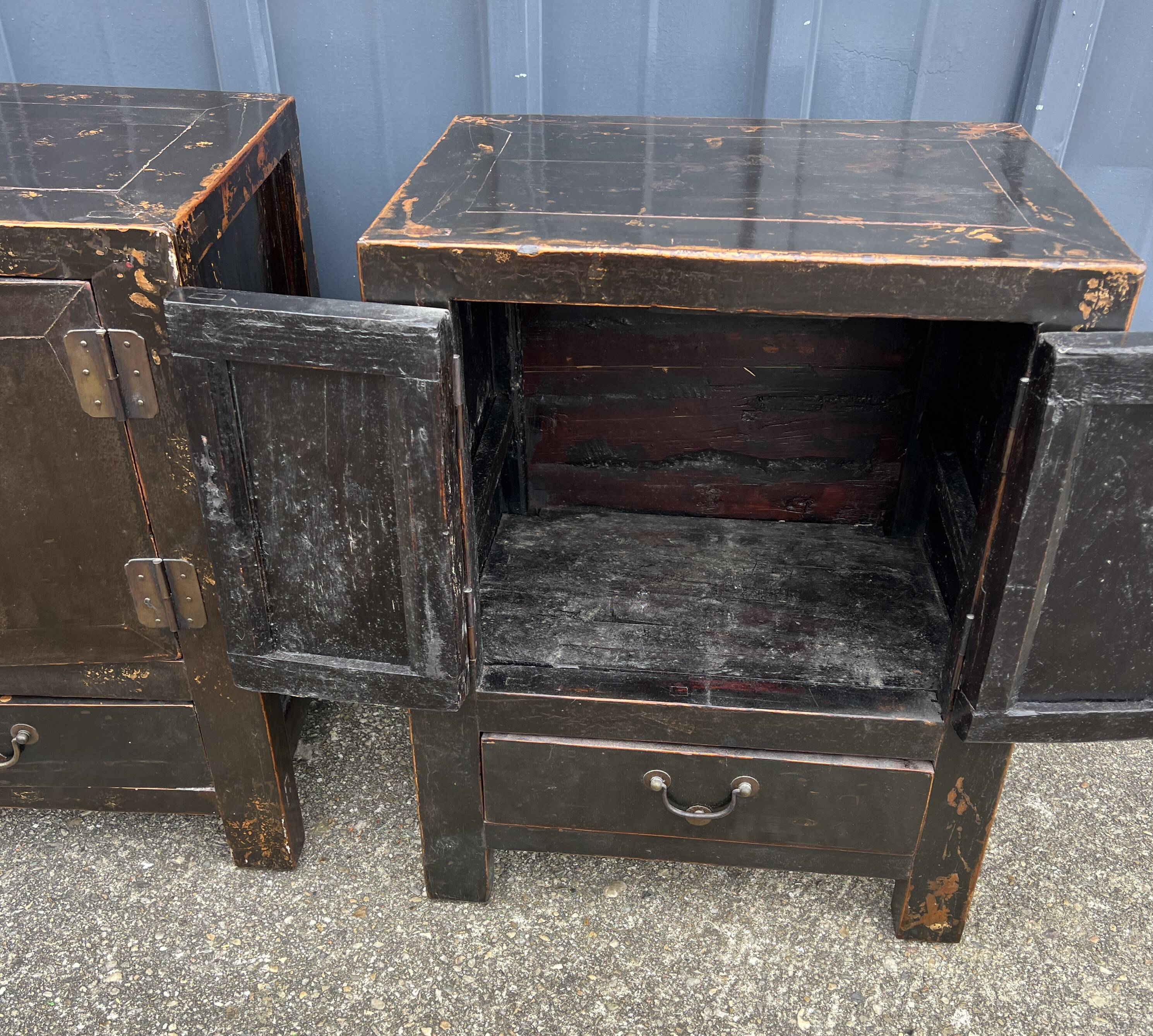 Pair of small occasional or sofa end pieces, lacquered in Asian black
