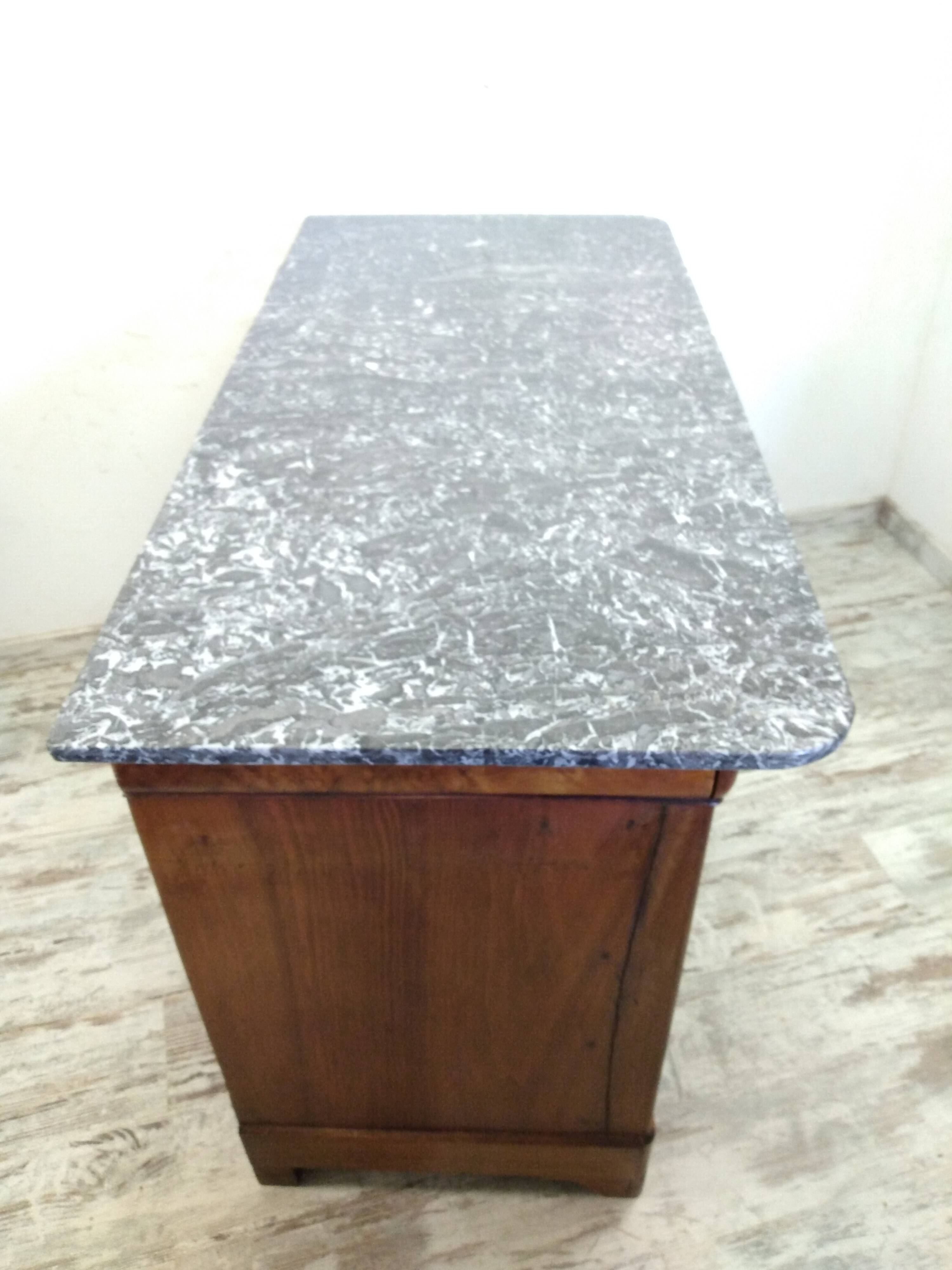 Chest of drawers with old marble