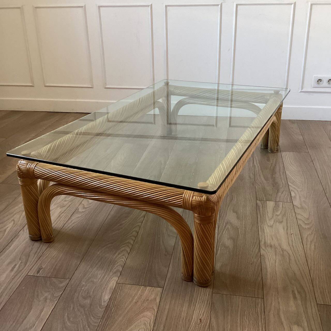 Large rattan and glass coffee table