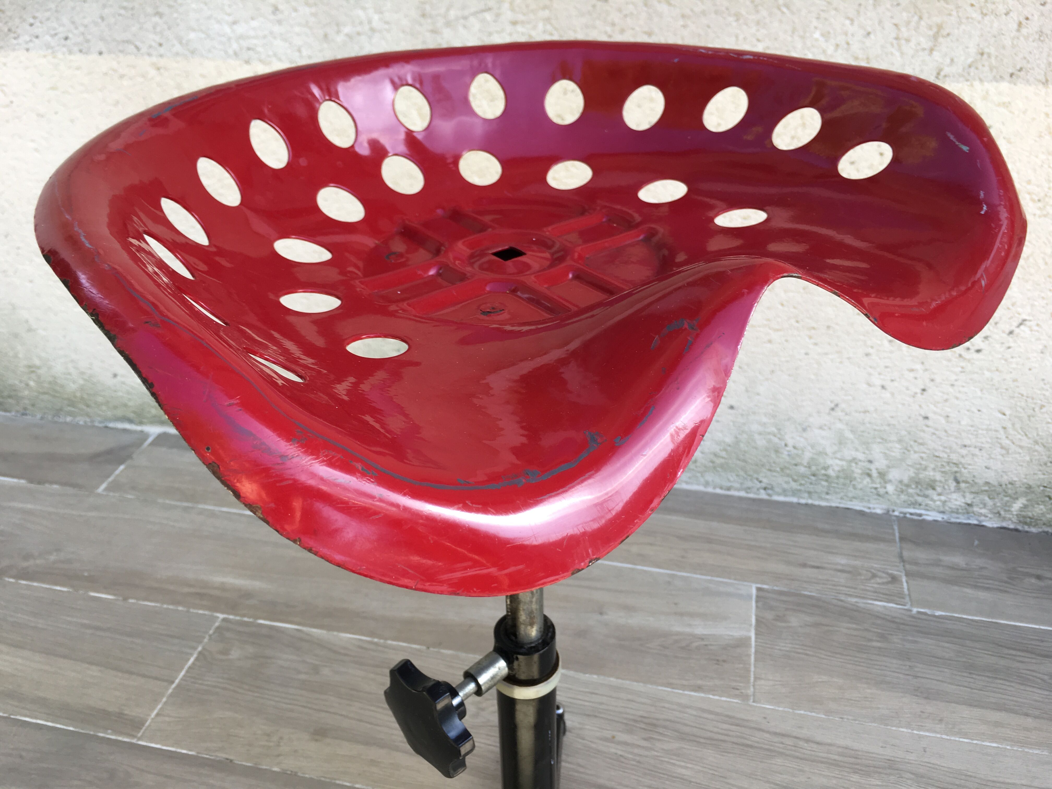 Vintage high stool sitting tractor