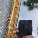 Antique Venetian mirror in gilded wood