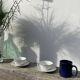 Pair of fine white and gold Limoges porcelain teacups