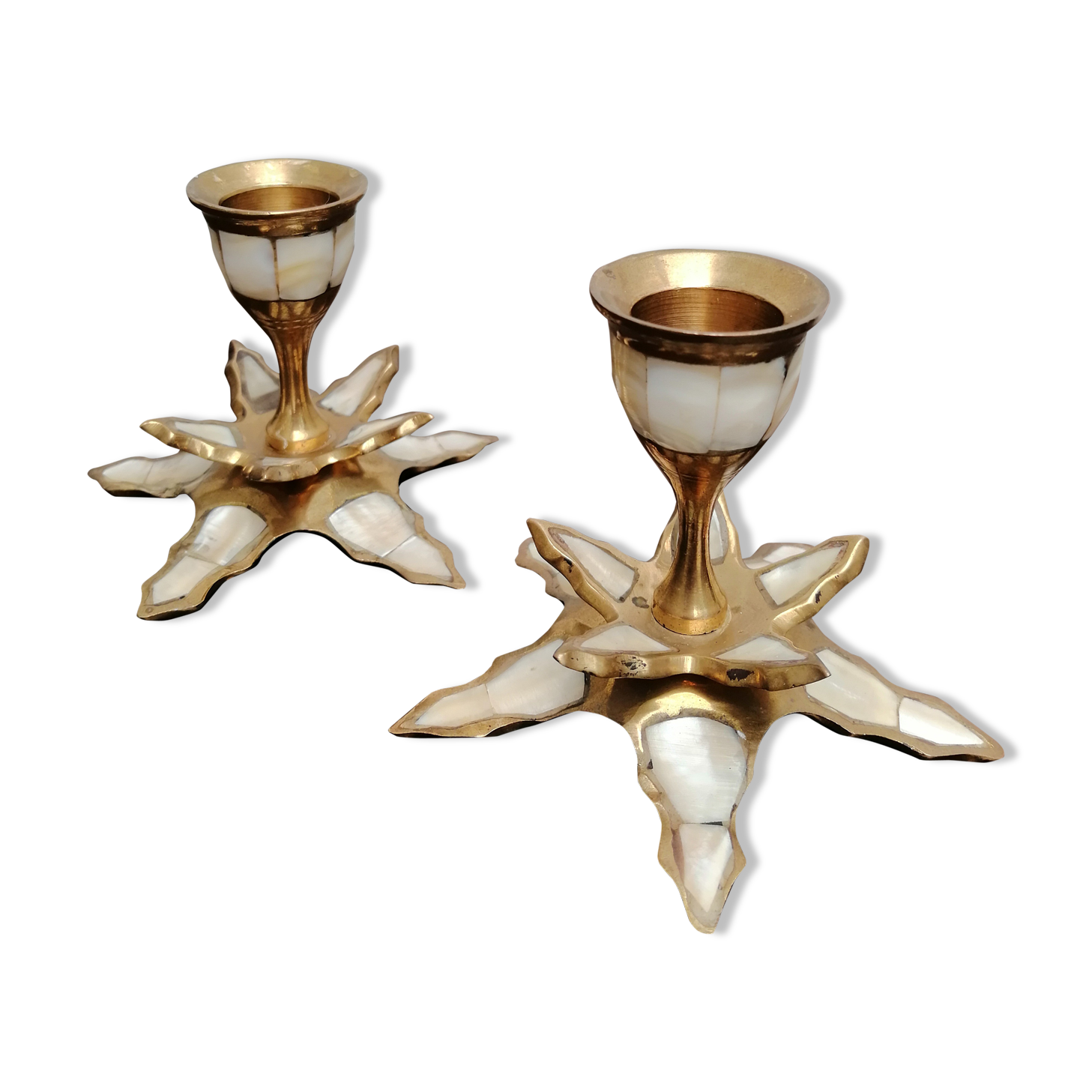 Mother-of-pearl palm and brass candlesticks