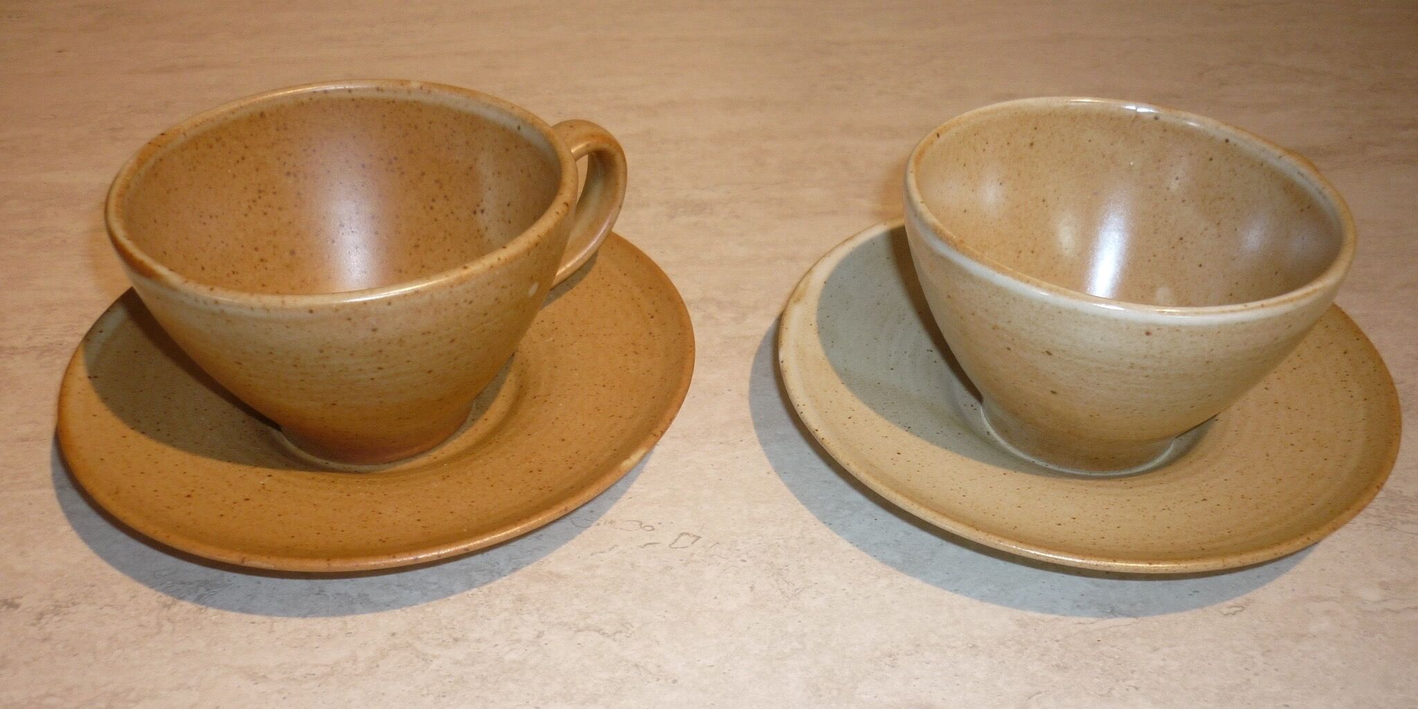 CNP Village stoneware cups and sub-cups
