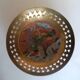Enamelled brass bowl with peacock decoration