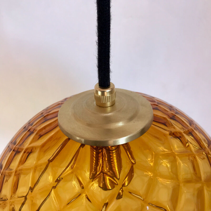 Amber glass globe suspension