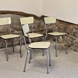 Set of 4 light yellow formica chairs