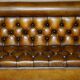 Pair of Victorian Chesterfield pub benches in leather.